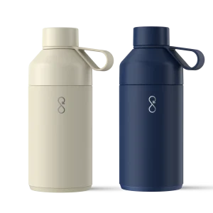Mid-size Mates Bundle_Two Ocean Bottle reusable bottles in light beige and navy blue on a white background.
