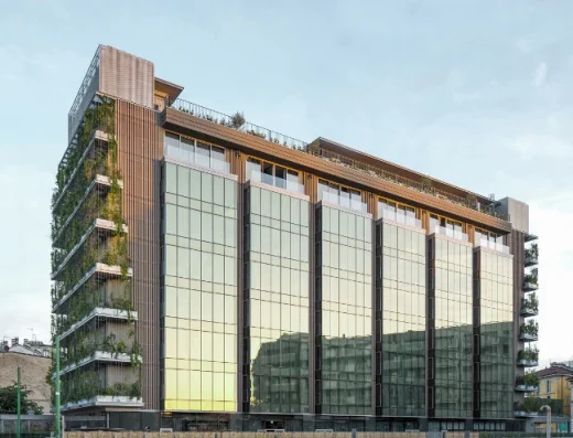 Modern glass exterior of Hotel VIU Milan with planted balconies and vertical greenery