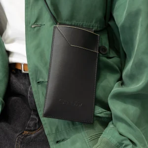 Vegan phone case in black with long shoulder strap and two card slots, made from corn waste material.