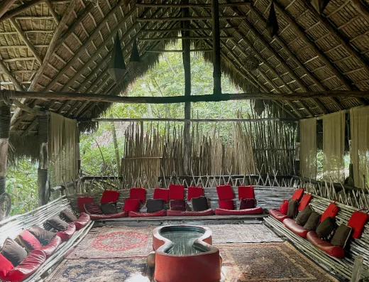 Dominican Tree House Village_outside view with red pillows